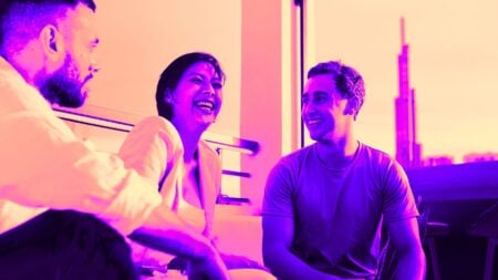 People in a rooftop bar meeting place, building new relationships.