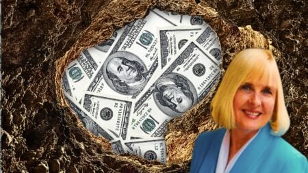 An image of a hole with money in it to represent real estate profit holes and real estate business profitability.