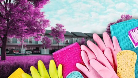 Cleaning gloves and sponges over a multifamily building to symbolize rental spring cleaning checklist.