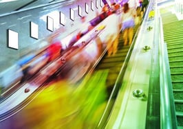 An escalator moving up quickly