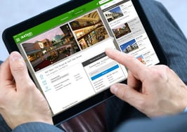 person using auction.com