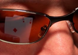 A man wearing sunglasses, not giving anything away