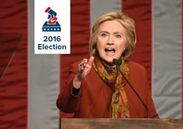 Hillary Clinton speaking into a microphone