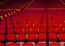 Empty seats in a theater.