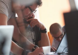 A group of young people working in a startup environment