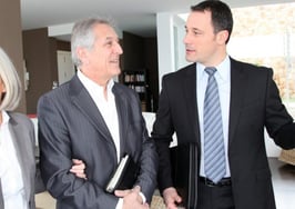 A real estate agent with two buyers