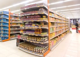 A grocery store full of shelves.