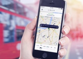 A woman calling an Uber