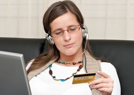 A young woman shopping online.