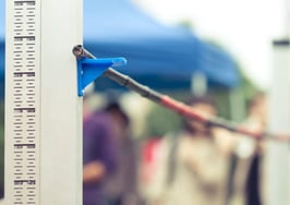 Measuring a high jump.