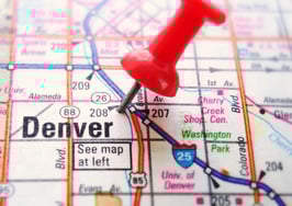 A map of Denver with a pin in it