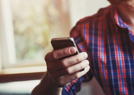 A man using a mobile phone