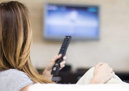 A woman watching television
