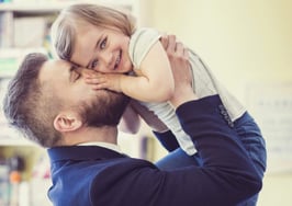 A young man greeting his daughter