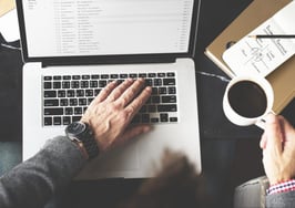 A man checking email on his computer