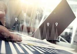 A man presenting charts