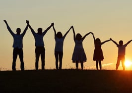 A group of people holding hands