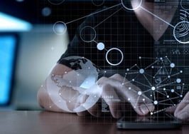 A man typing on a keyboard