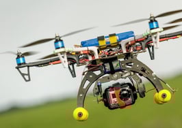 A man flying a drone