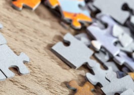 Four puzzle pieces connected