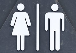 A bathroom sign
