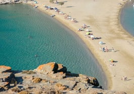 The Kolona double sided beach at Kythnos, Greece as viewed from Aghios Loukas islet