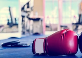 A pair of boxing gloves, red and blue