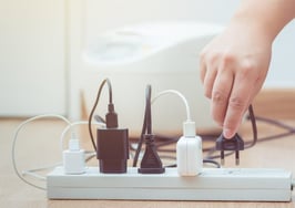 Plugging a plug into a power strip