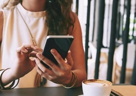 A woman texting on her cell phone