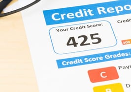 A credit report with a low score