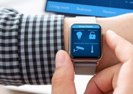 A man with a smart home app on his watch