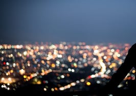 A man gazing into the city skyline