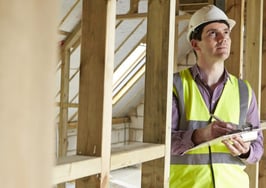 A home inspector in a new property