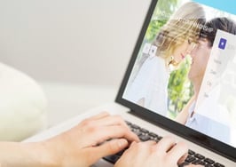 A woman logging into an online dating site