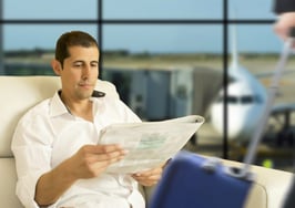 A man in a luxury airport lounge