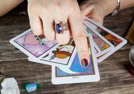 A female fortune teller with Tarot cards