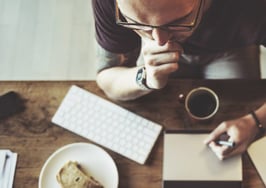 A man concentrating at his desk