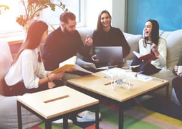 A group of young freelancers talking about work