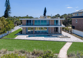 Will a bitcoin buyer bite on this designer beachfront home?