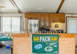 Packer fan party house first to require digital currency blockchain
