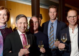 Monty Moran (center) and company