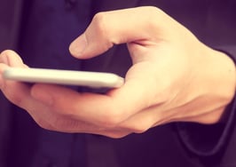 A man using his cell phone