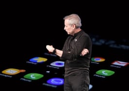 Gary Keller in front of a smartphone tech KW Keller Williams