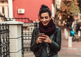 Woman looking at smartphone