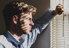 Neighbor staring through blinds