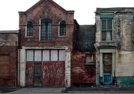 Home prices in opportunity zones continue to fall behind