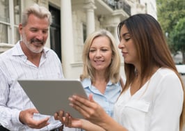 People looking at a tablet