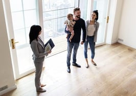 Agent showing family a home for sale