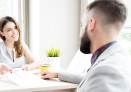 Woman at business table