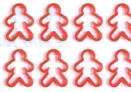 Rows of red cookie cutters